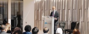 Muraly Srinarayanathas speaking at an event in Ottawa, discussing global skilling centers.